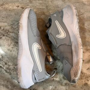 Nike youth slip on sneakers - gray - Size 4